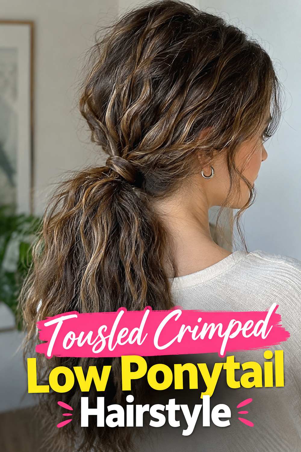 Tousled Crimped Low Ponytail Hairstyle