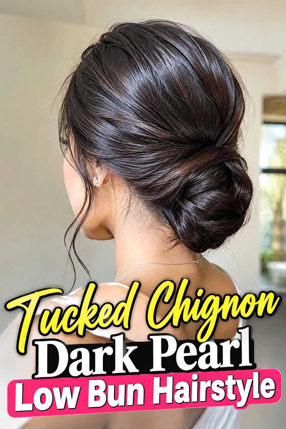 12. Tucked Chignon Dark Pearl Low Bun Hairstyle