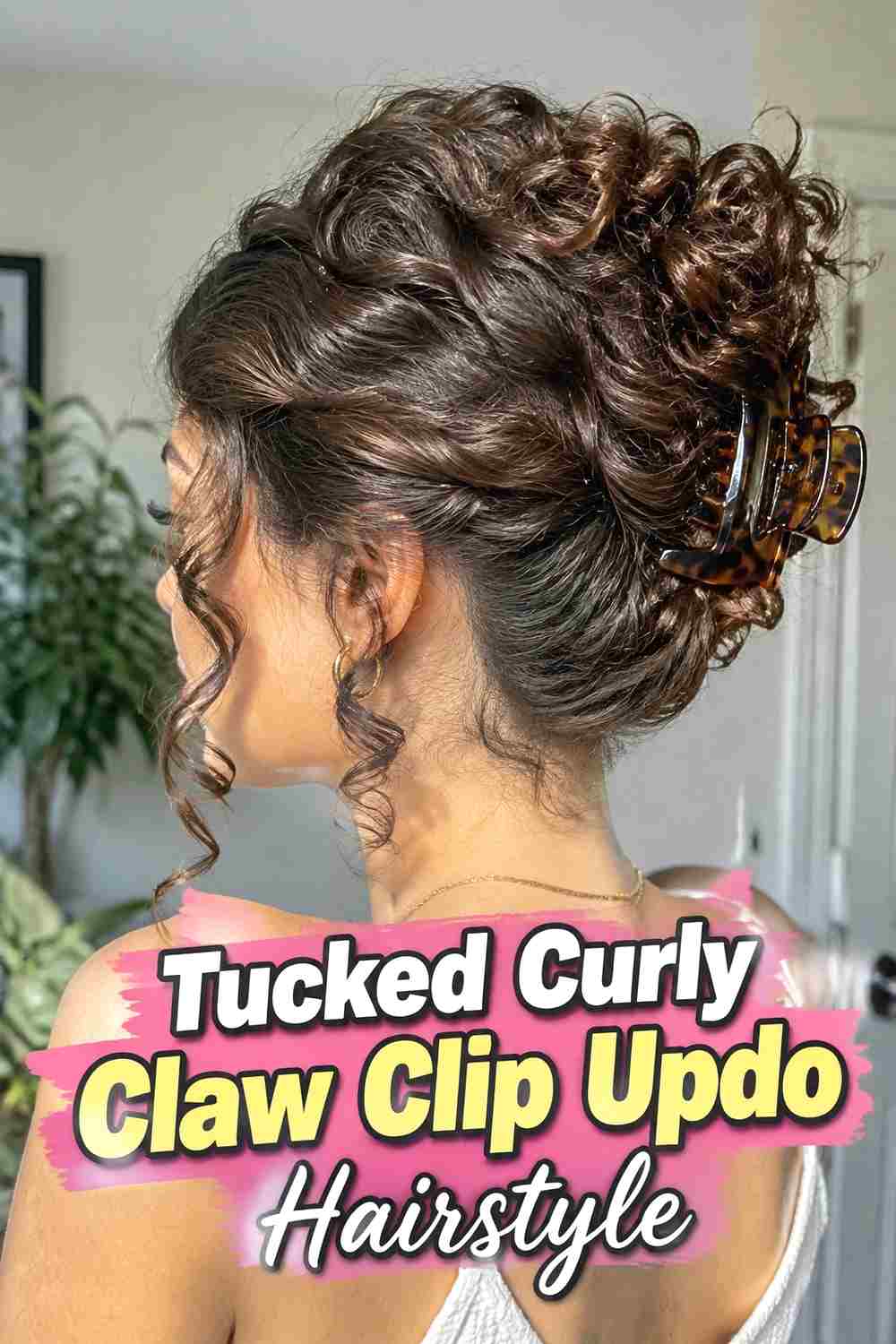 15. Tucked Curly Claw Clip Updo Hairstyle