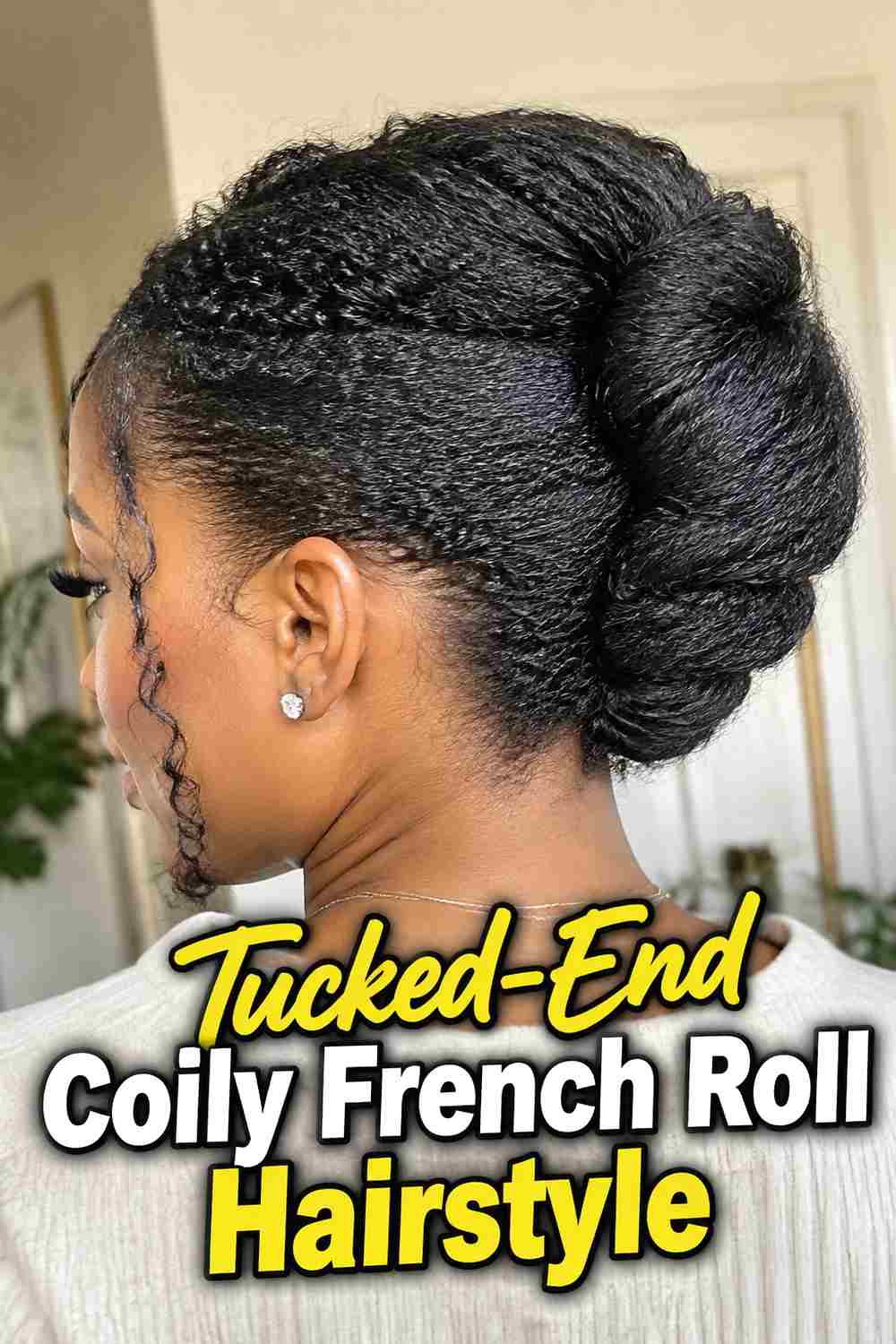 10. Tucked End Coily French Roll Hairstyle