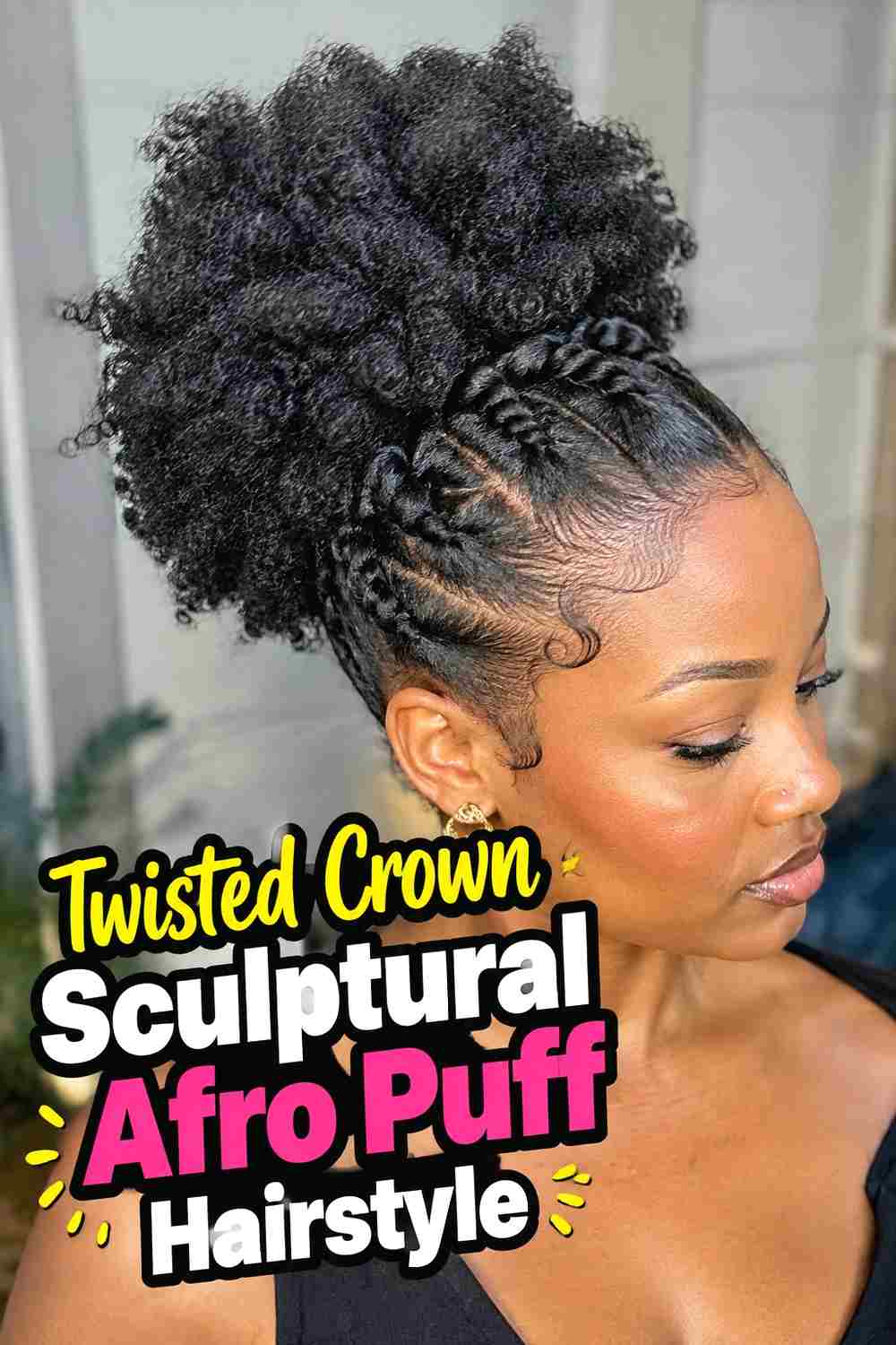 6. Twisted Crown Sculptural Afro Puff Hairstyle