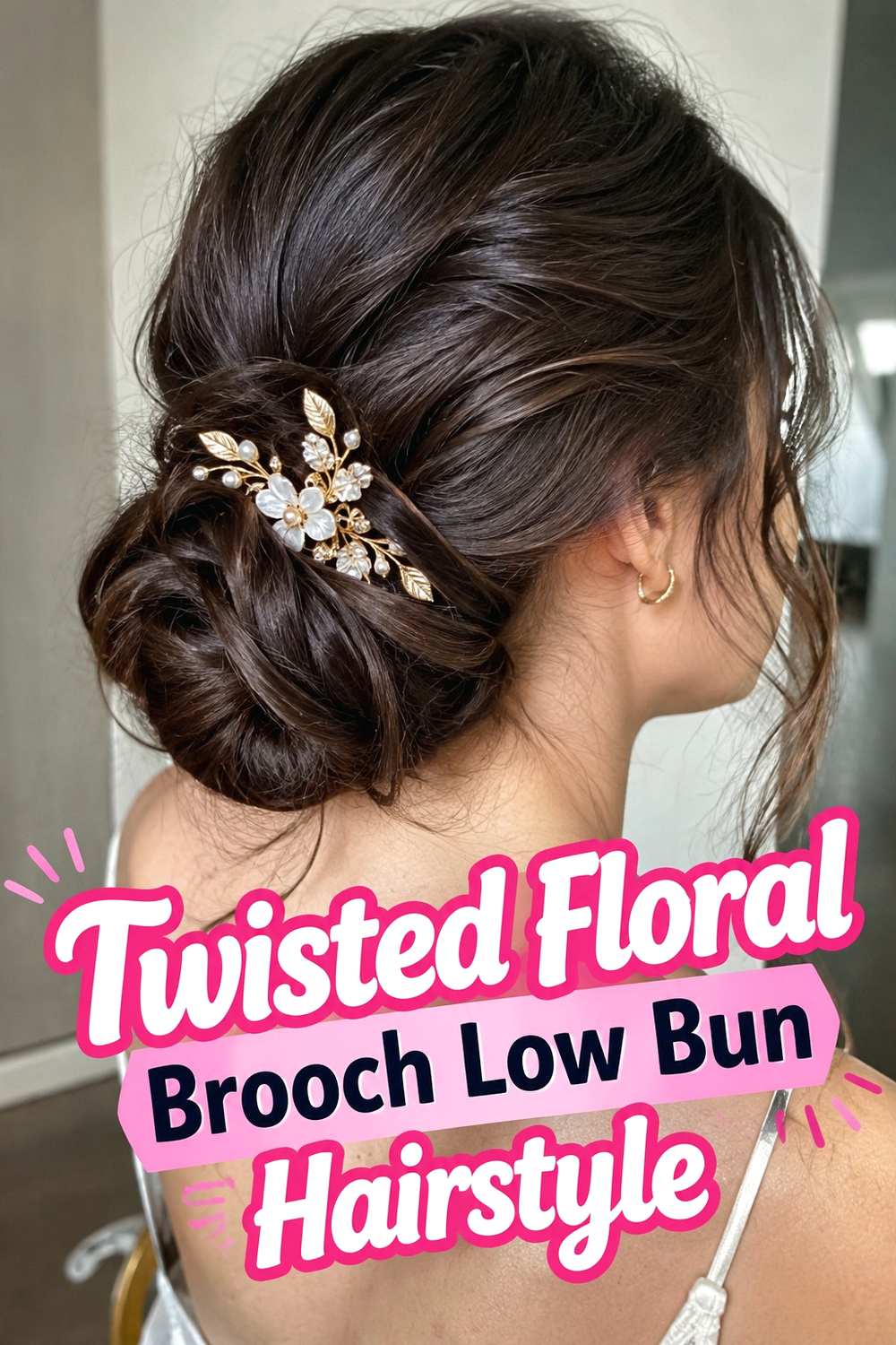 3. Twisted Floral Brooch Low Bun Hairstyle