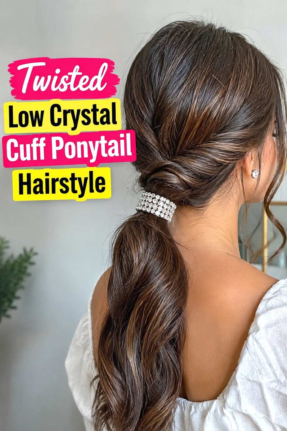7. Twisted Low Crystal Cuff Ponytail Hairstyle