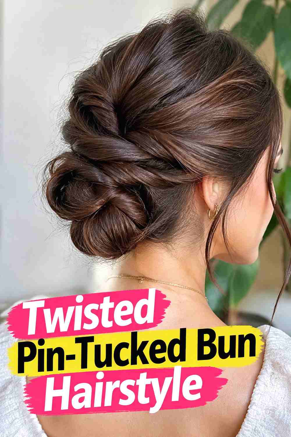 4. Twisted Pin Tucked Bun Hairstyle