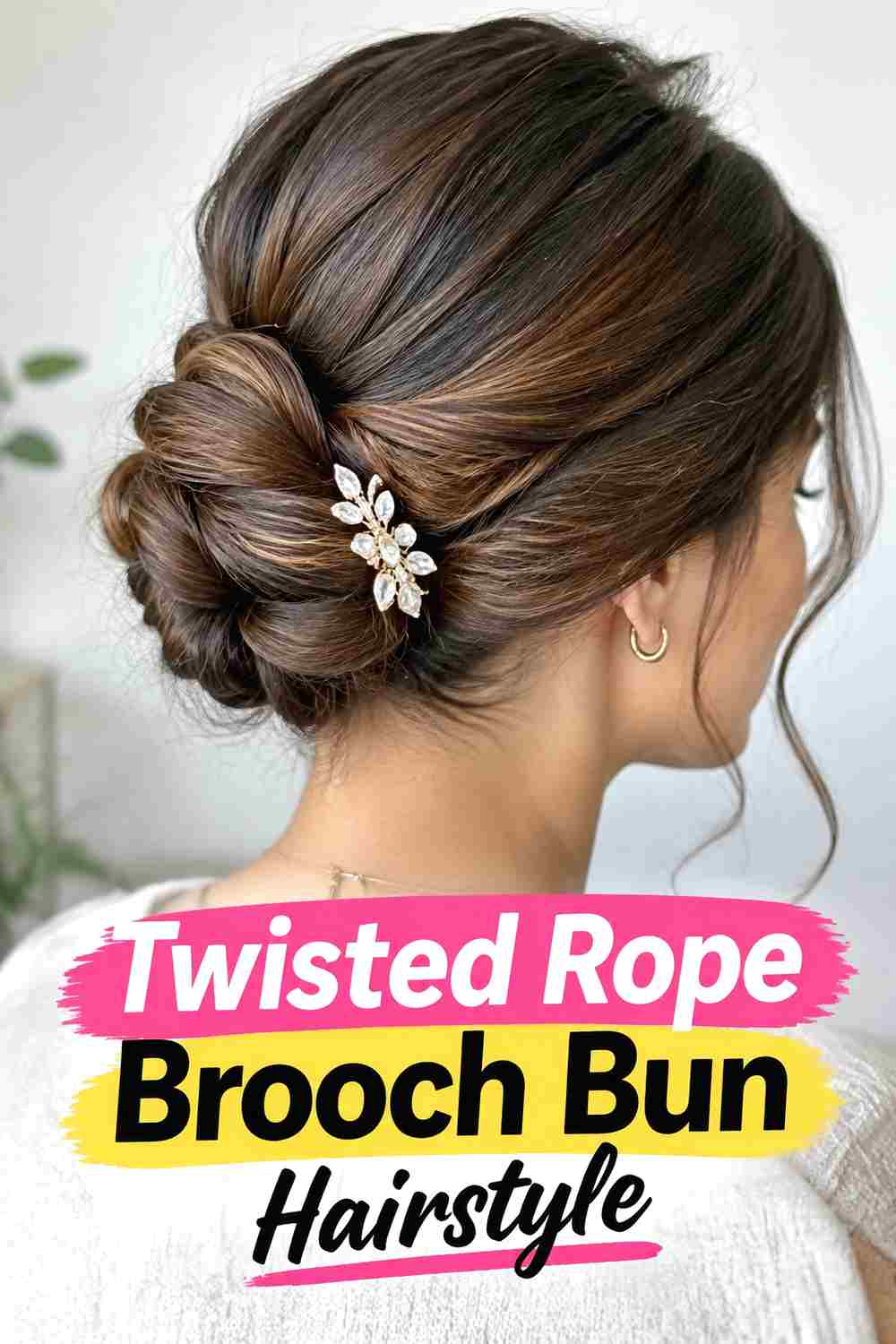 15. Twisted Rope Brooch Bun Hairstyle
