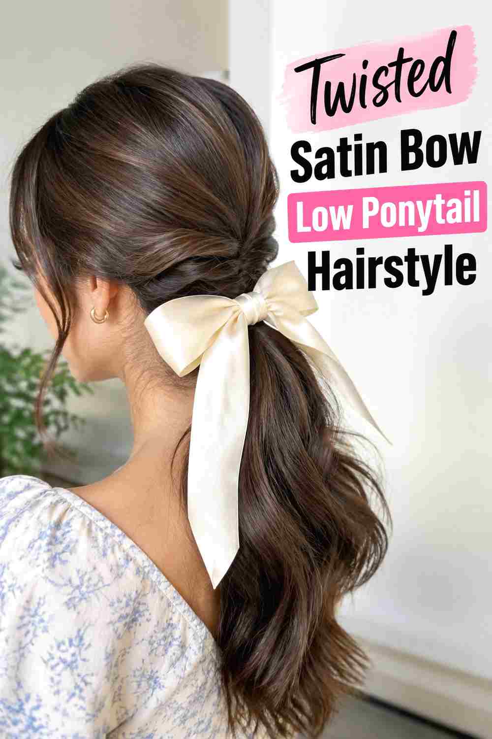 8. Twisted Satin Bow Low Ponytail Hairstyle