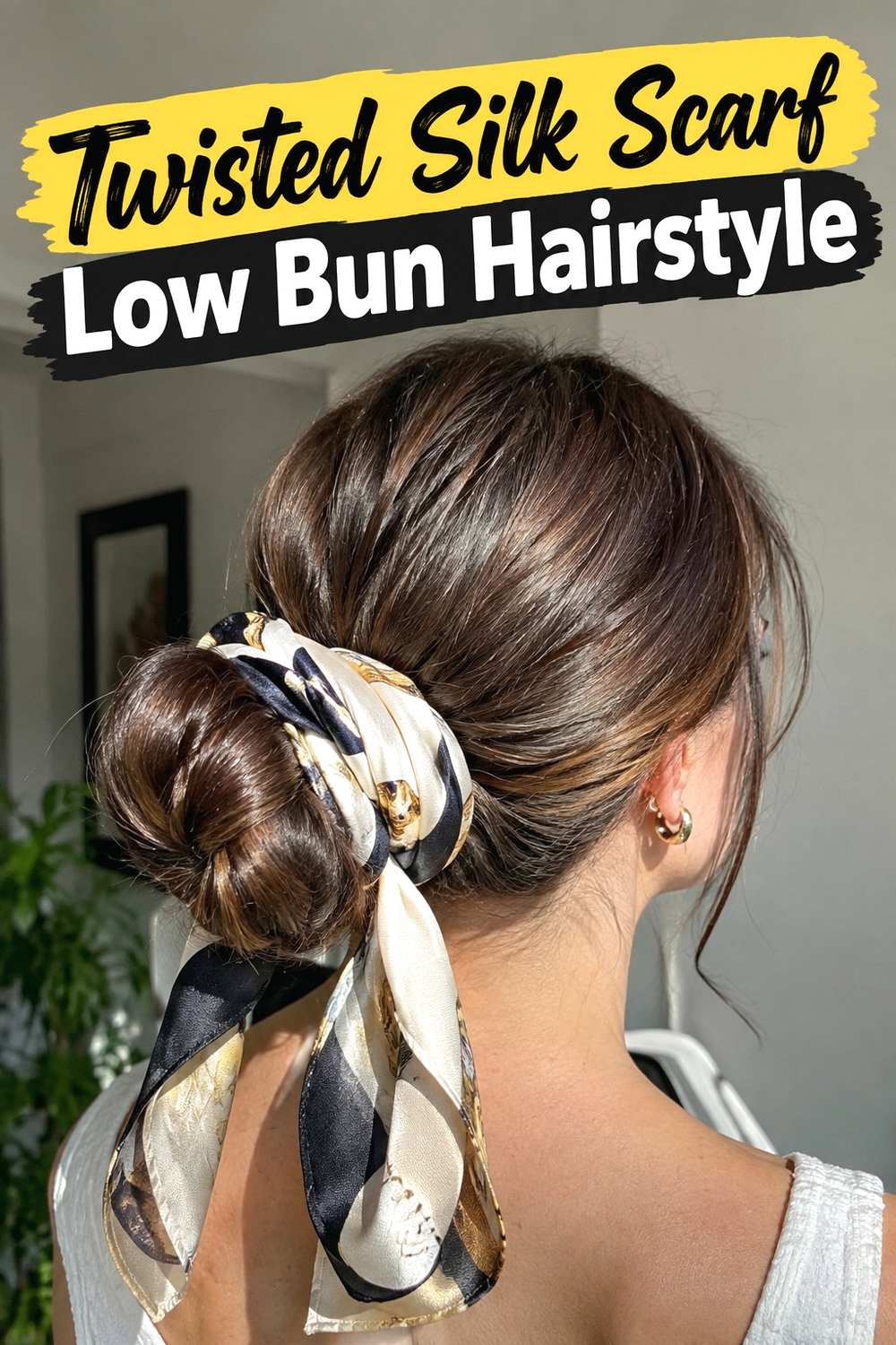 5. Twisted Silk Scarf Low Bun Hairstyle