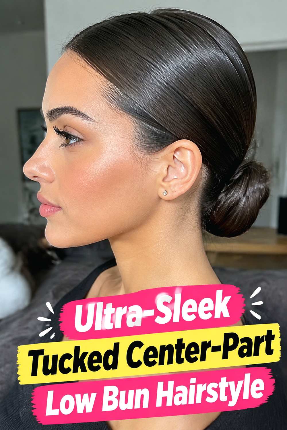 Ultra-Sleek Tucked Center-Part Low Bun Hairstyle