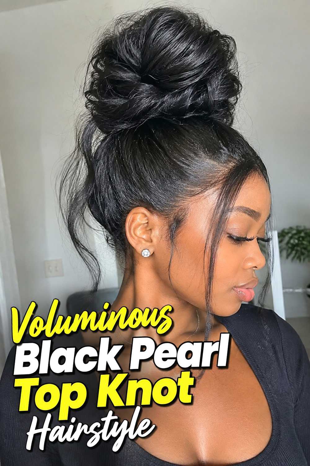 11. Voluminous Black Pearl Top Knot Hairstyle
