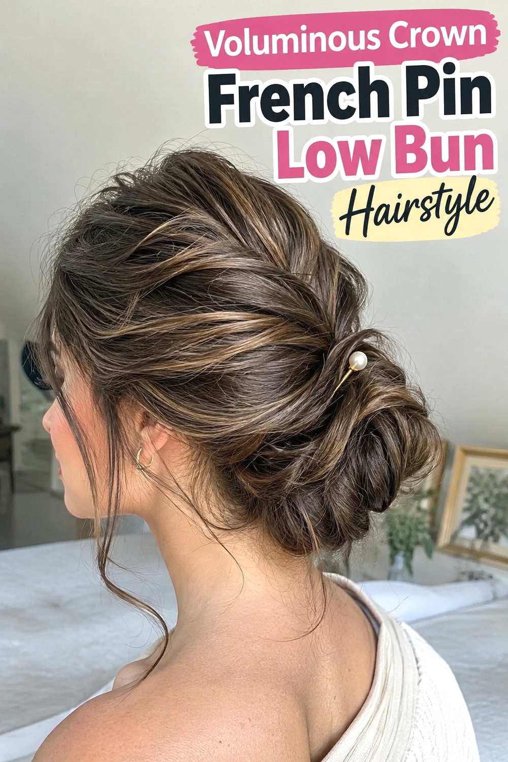 12. Voluminous Crown French Pin Low Bun Hairstyle