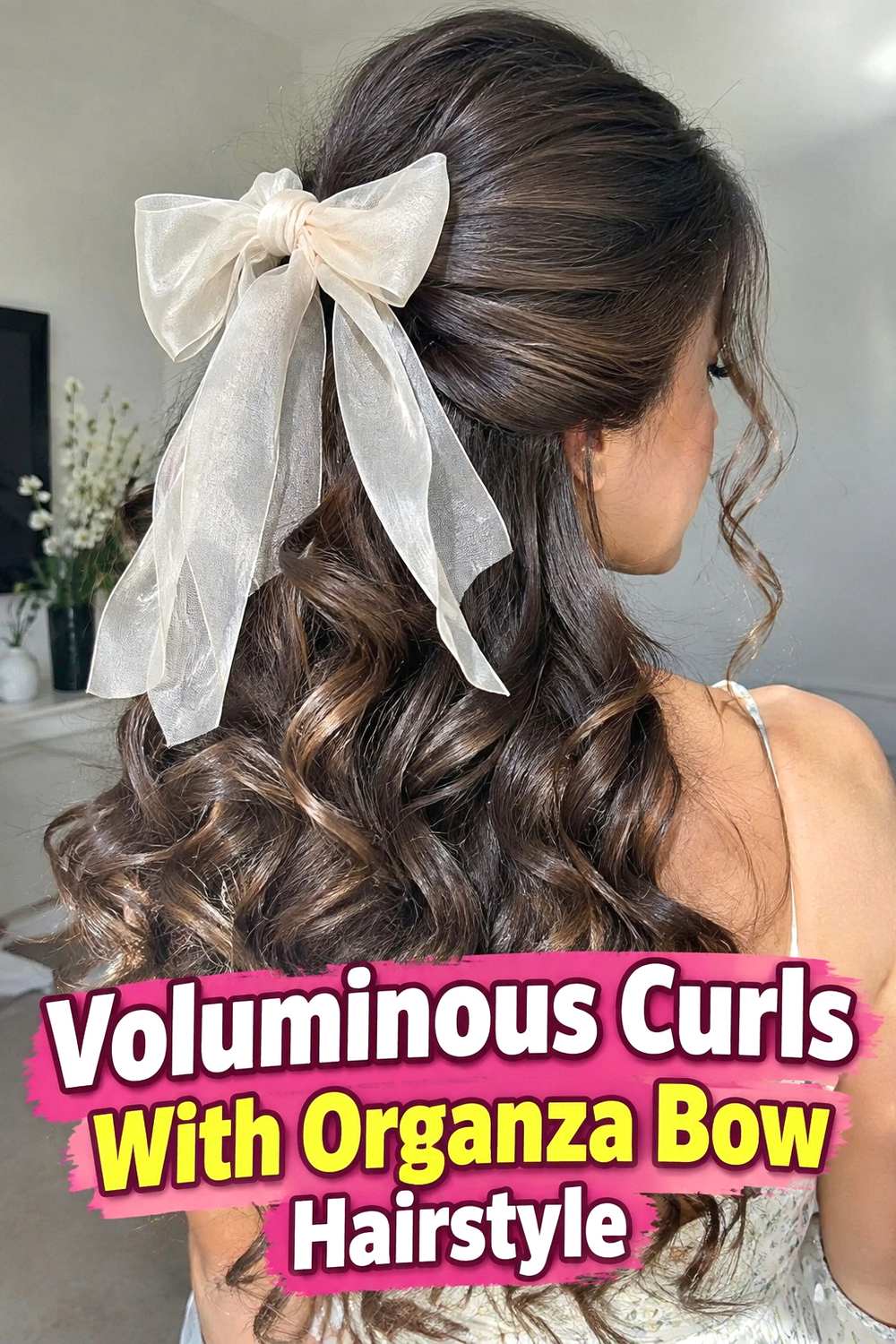 11. Voluminous Curls With Organza Bow Hairstyle