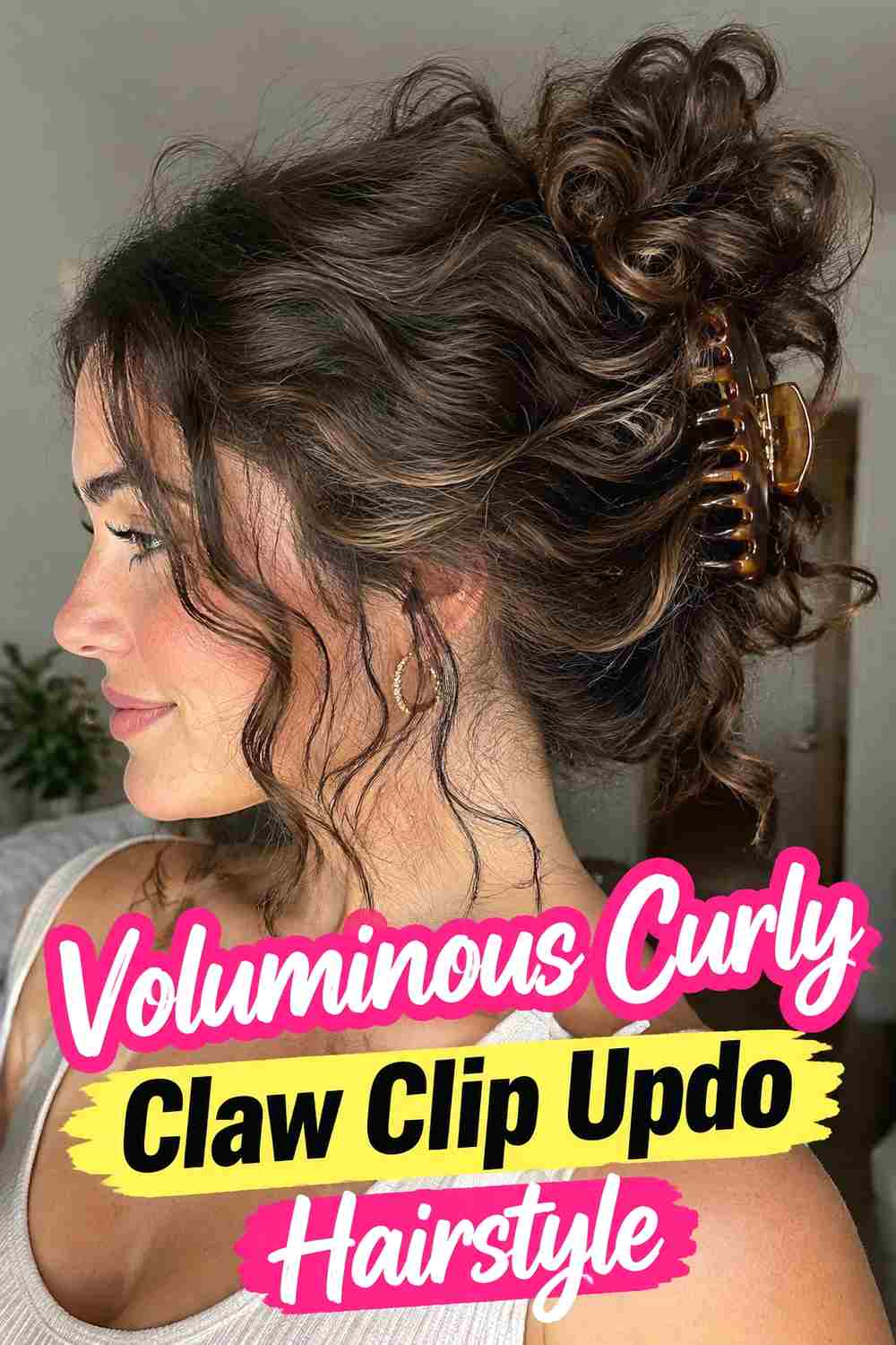 9. Voluminous Curly Claw Clip Updo Hairstyle