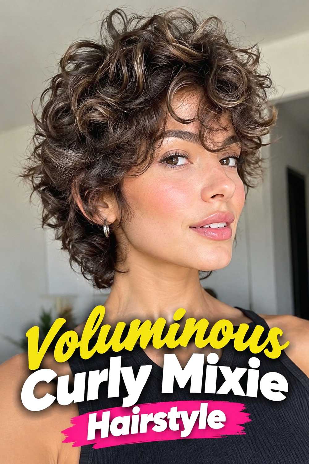 9. Voluminous Curly Mixie Hairstyle