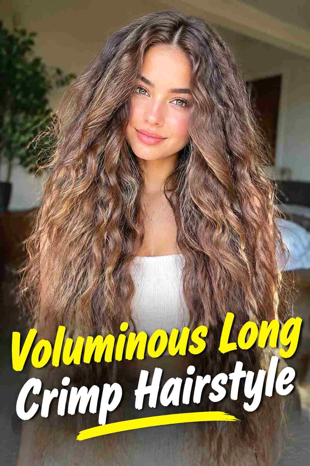 2. Voluminous Long Crimp Hairstyle