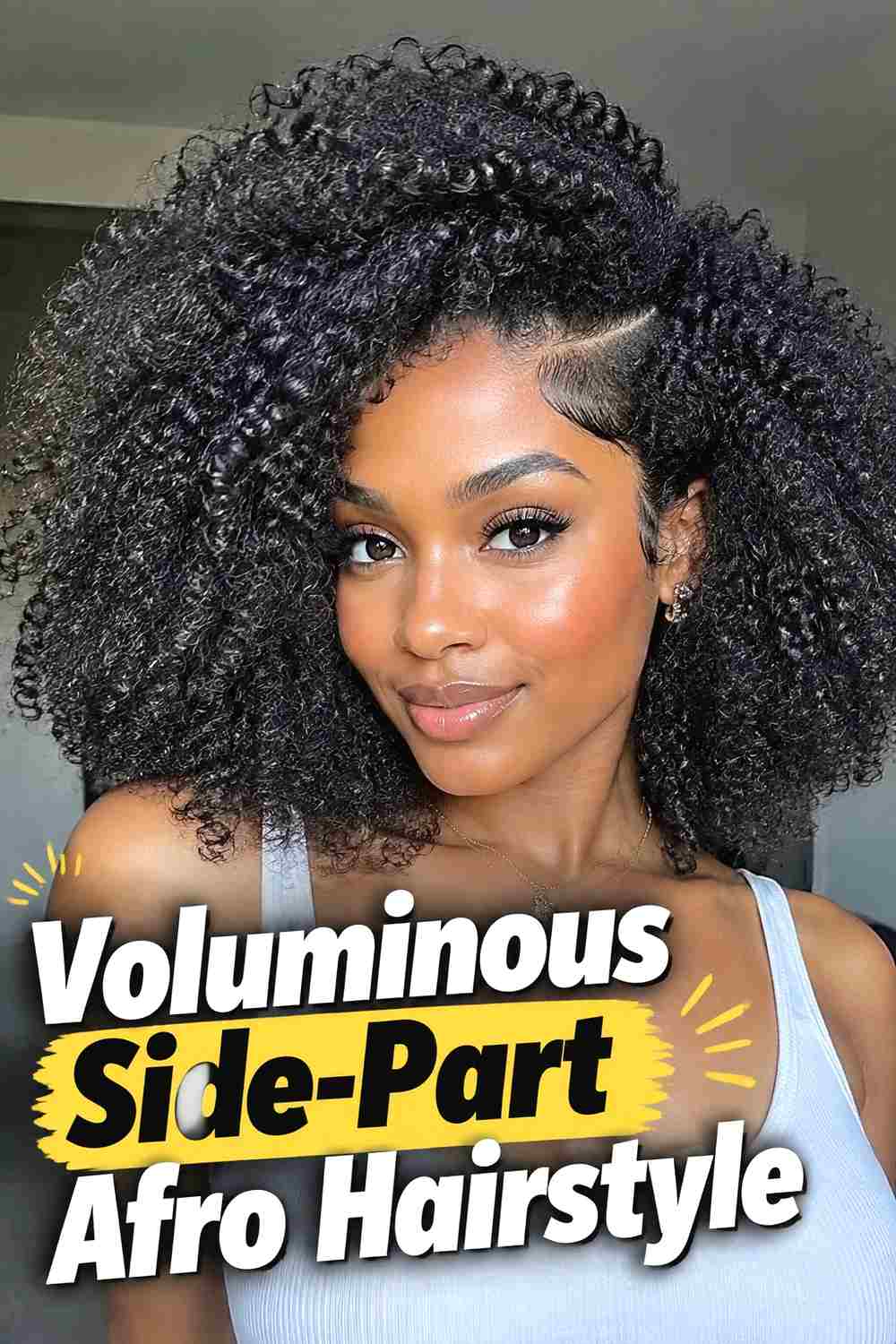2. Voluminous Side Part Afro Hairstyle