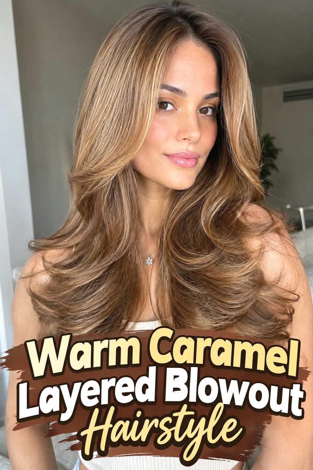 8. Warm Caramel Layered Blowout Hairstyle