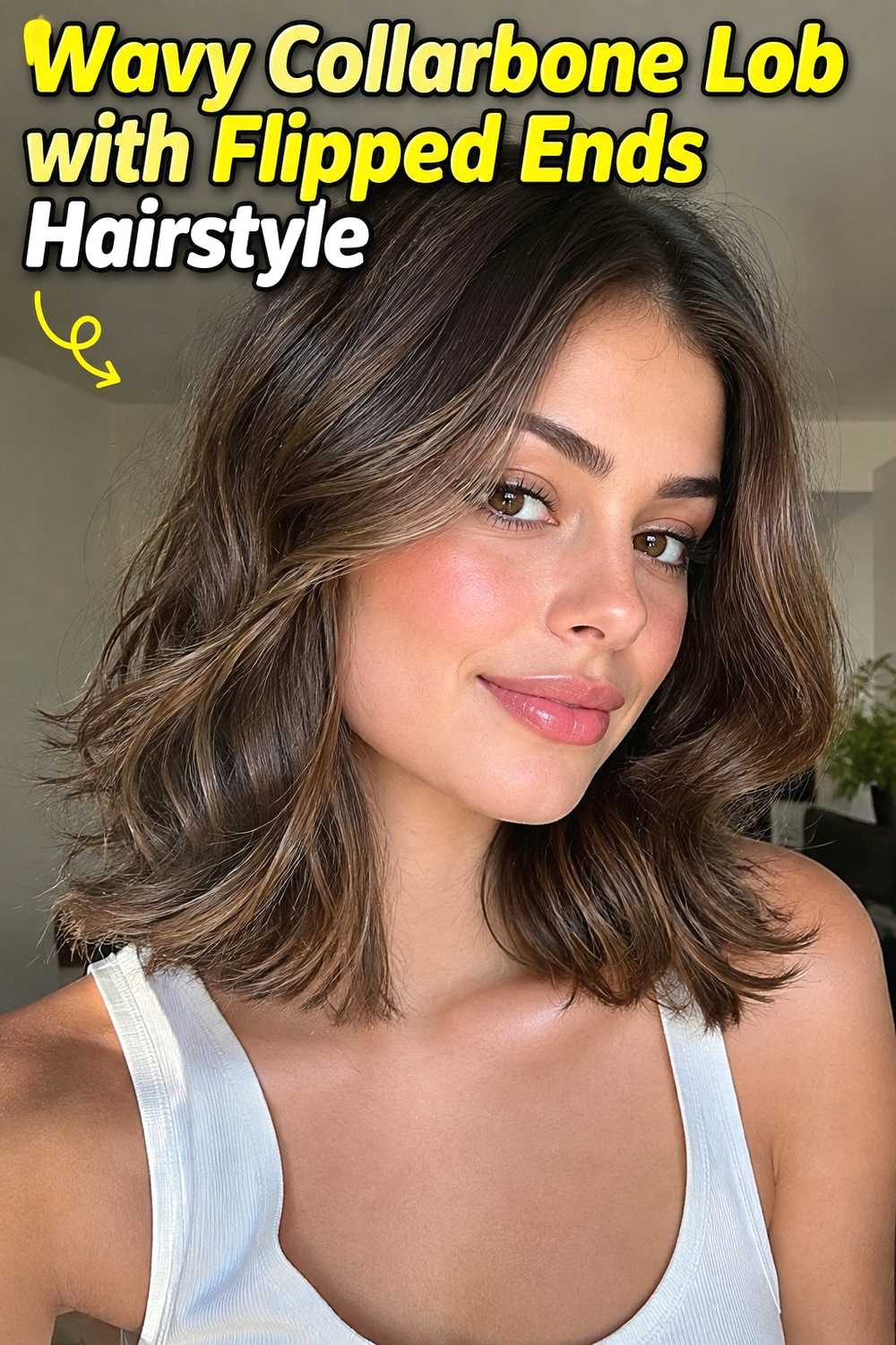 4. Wavy Collarbone Lob With Flipped Ends Hairstyle