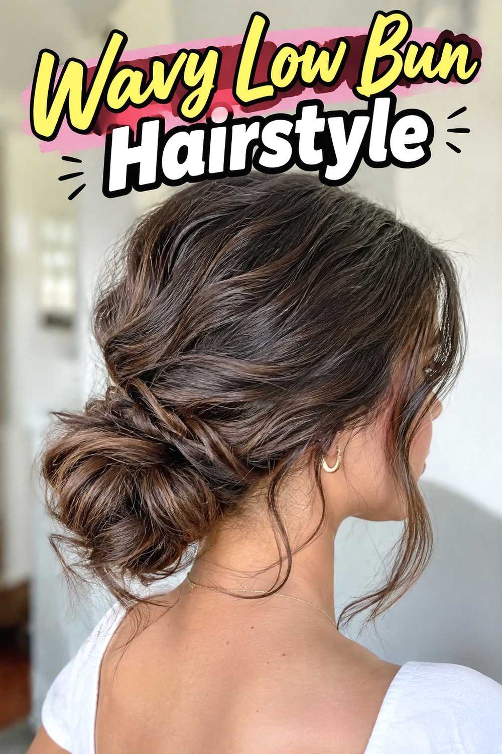 15. Wavy Low Bun Hairstyle