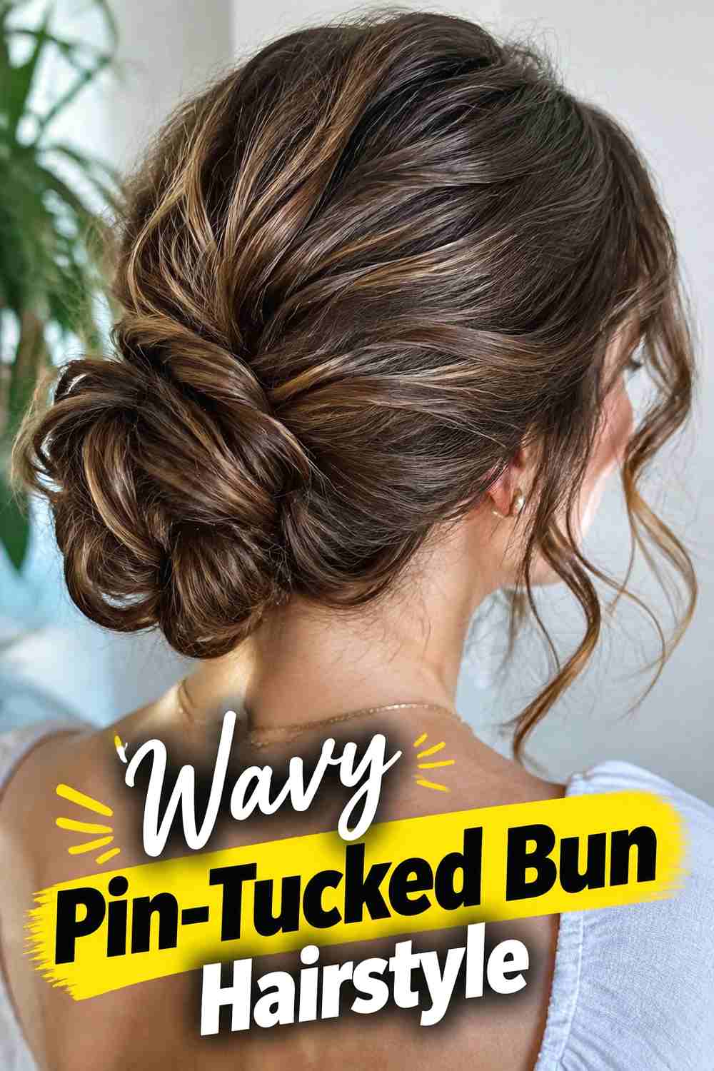 11. Wavy Pin Tucked Bun Hairstyle