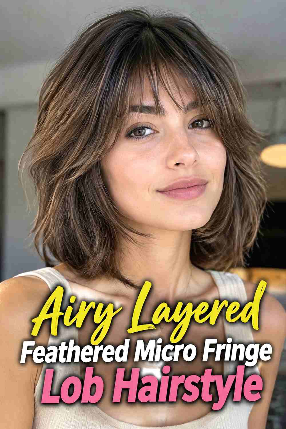 3. Airy Layered Feathered Micro Fringe Lob Hairstyle