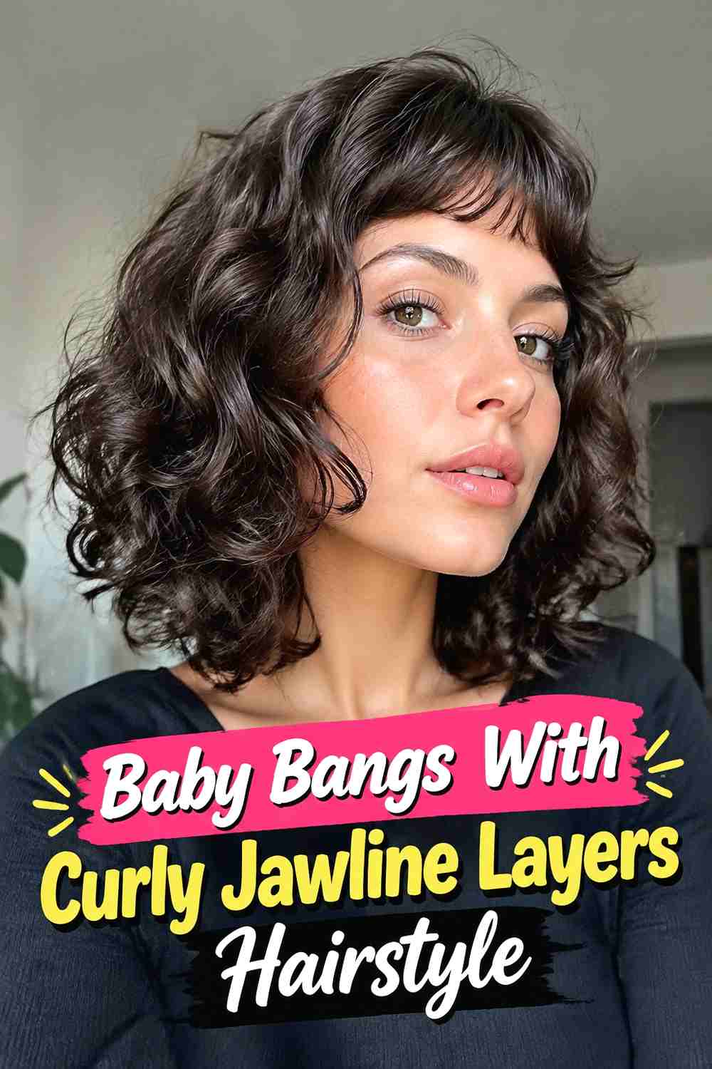 12. Baby Bangs With Curly Jawline Layers Hairstyle