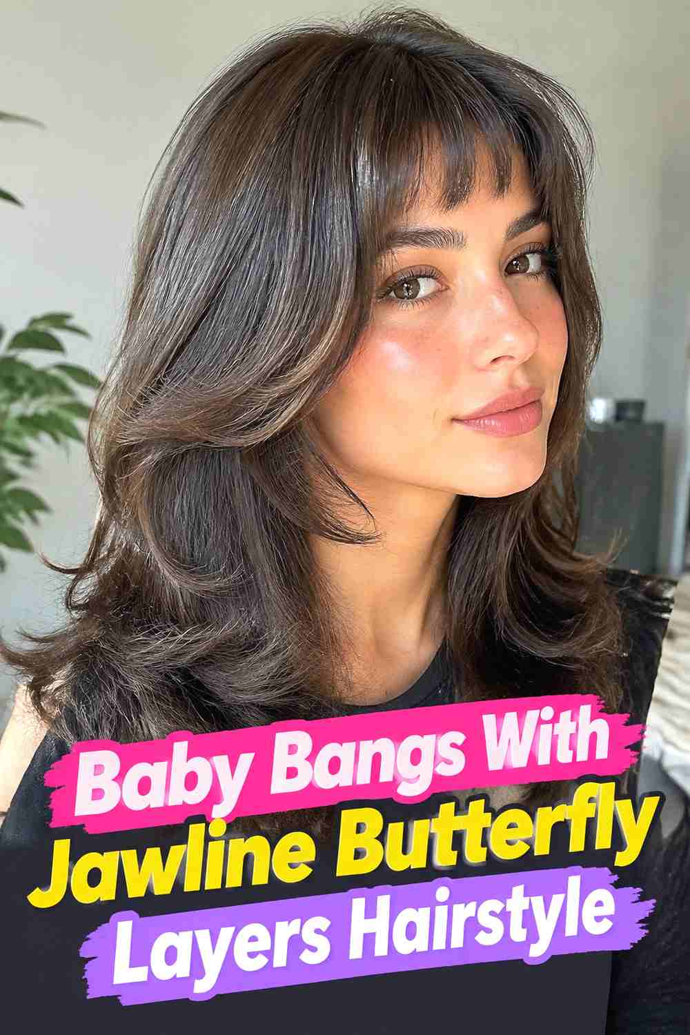 16. Baby Bangs With Jawline Butterfly Layers Hairstyle