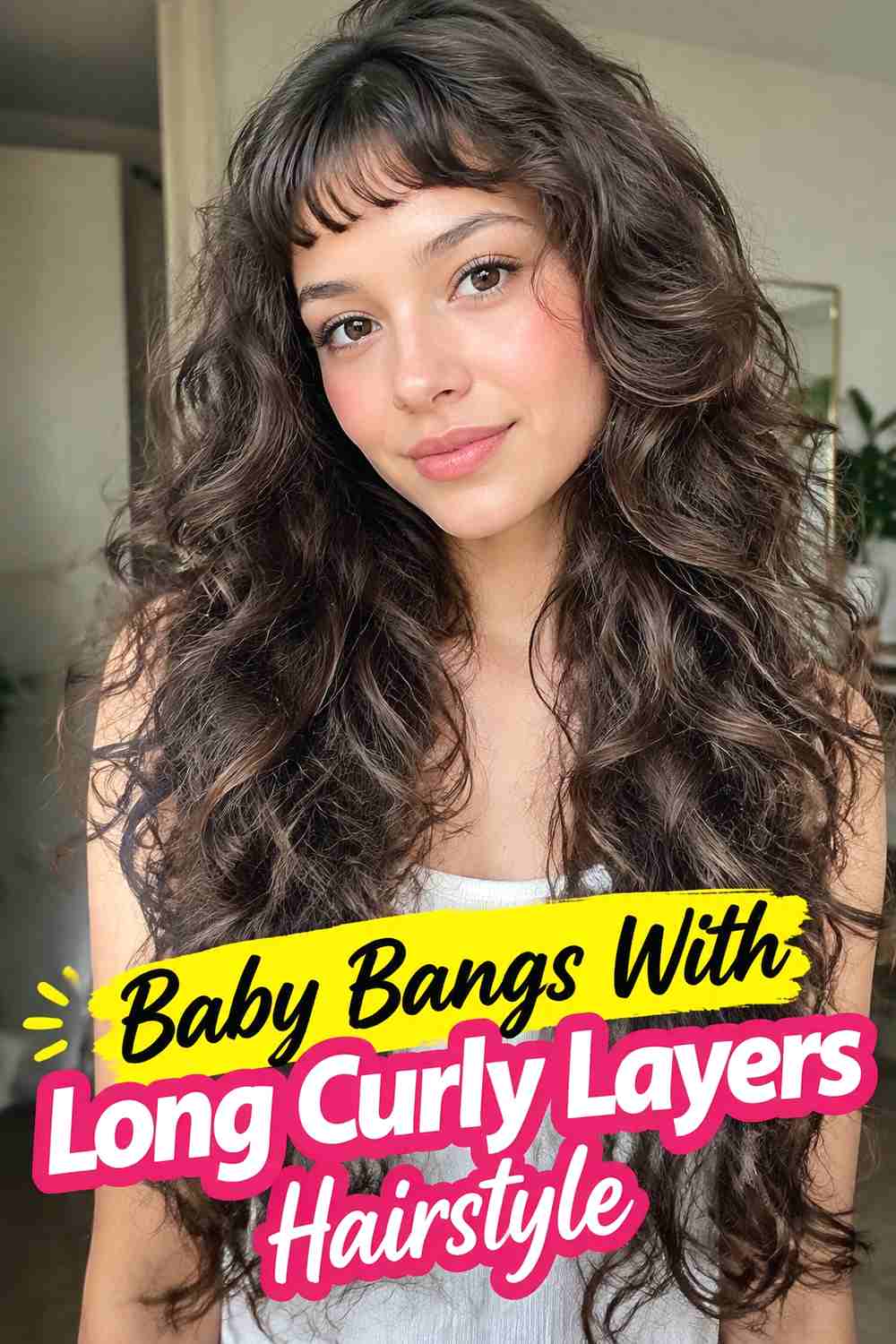 11. Baby Bangs With Long Curly Layers Hairstyle