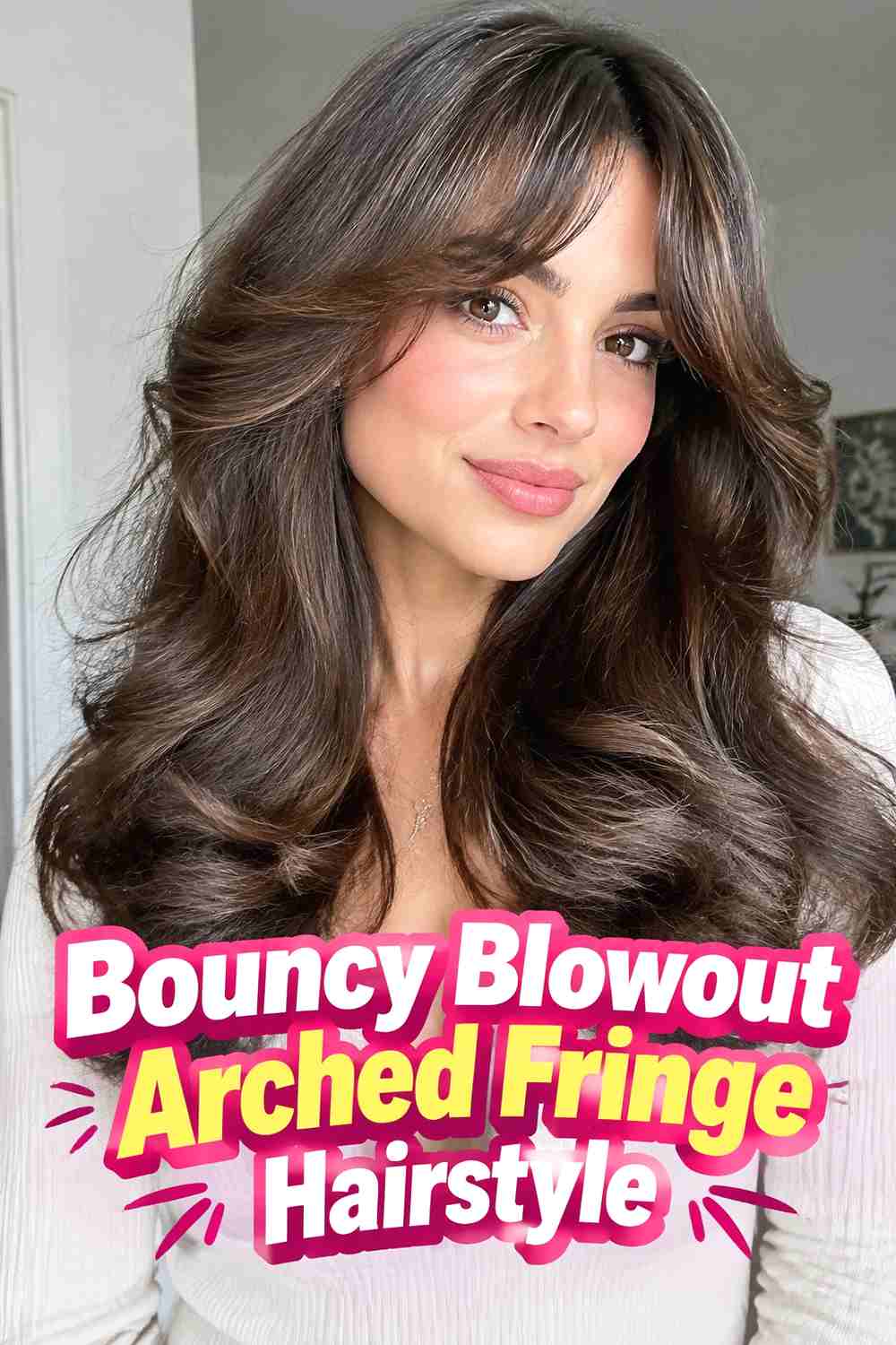 13. Bouncy Blowout Arched Fringe Hairstyle