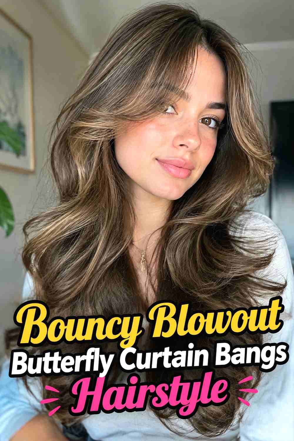 8. Bouncy Blowout Butterfly Curtain Bangs Hairstyle