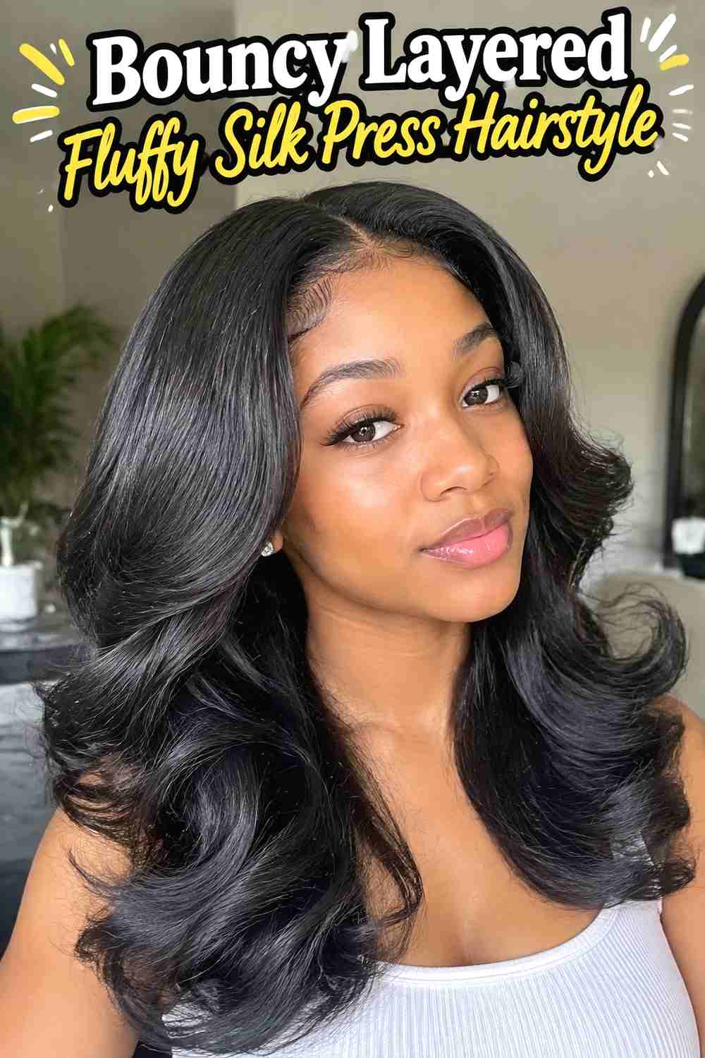 4. Bouncy Layered Fluffy Silk Press Hairstyle