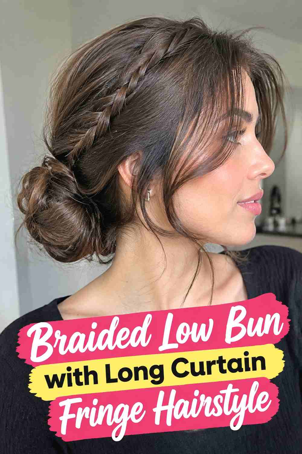 6. Braided Low Bun With Long Curtain Fringe Hairstyle