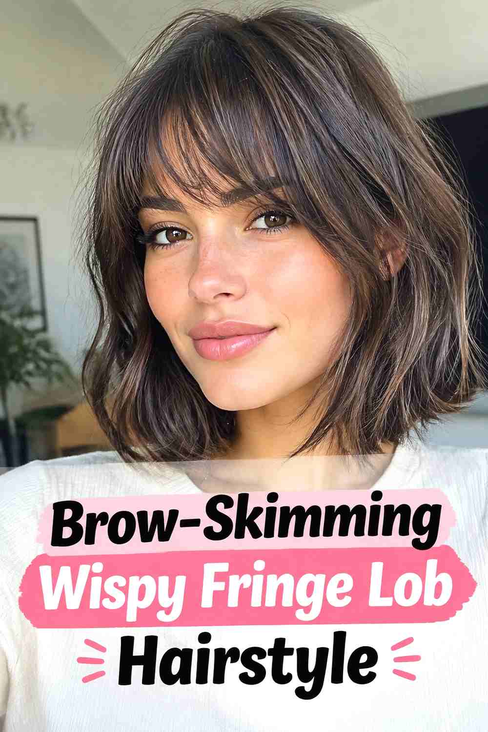 4. Brow Skimming Wispy Fringe Lob Hairstyle