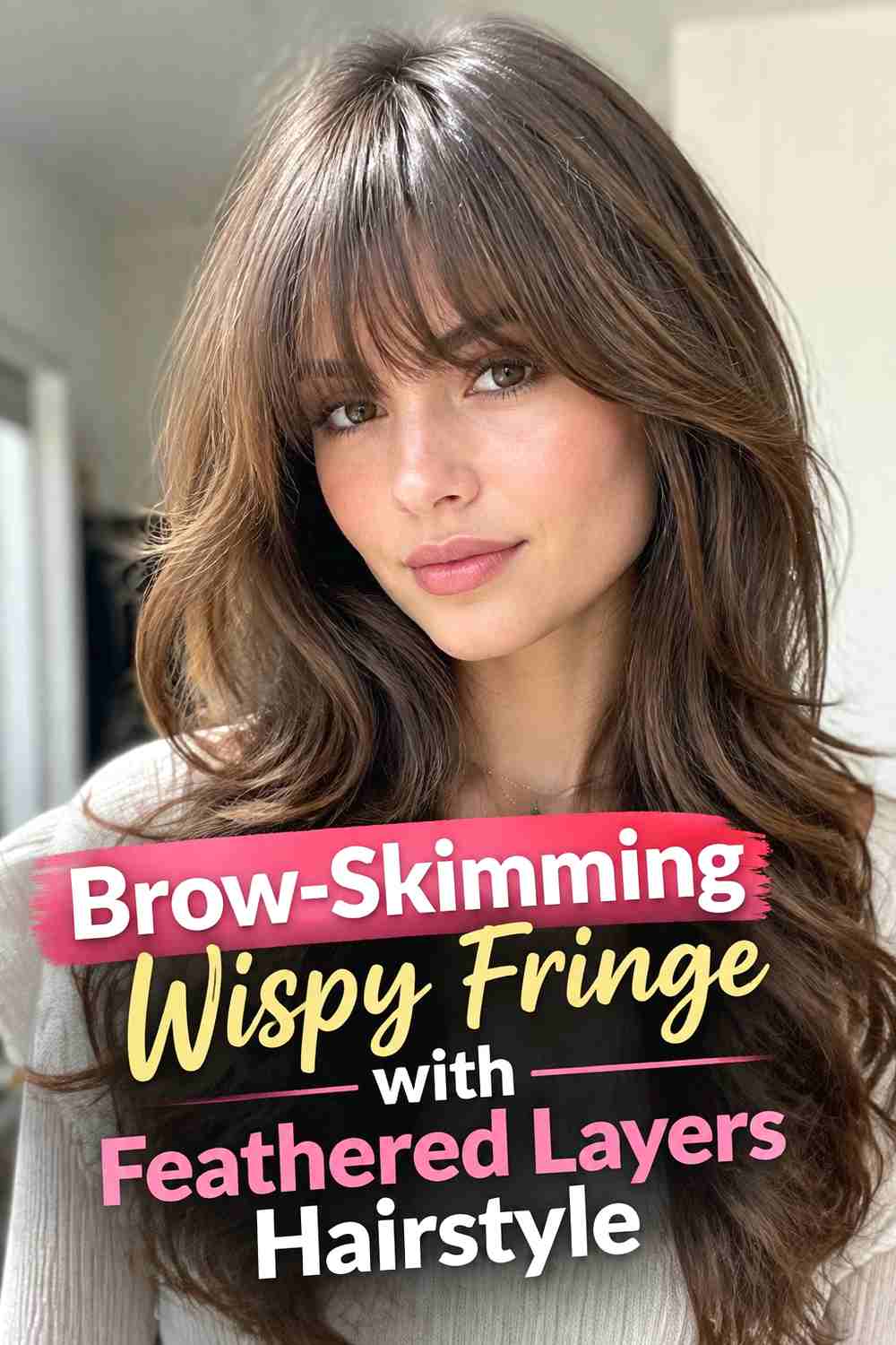 17. Brow Skimming Wispy Fringe With Feathered Layers Hairstyle