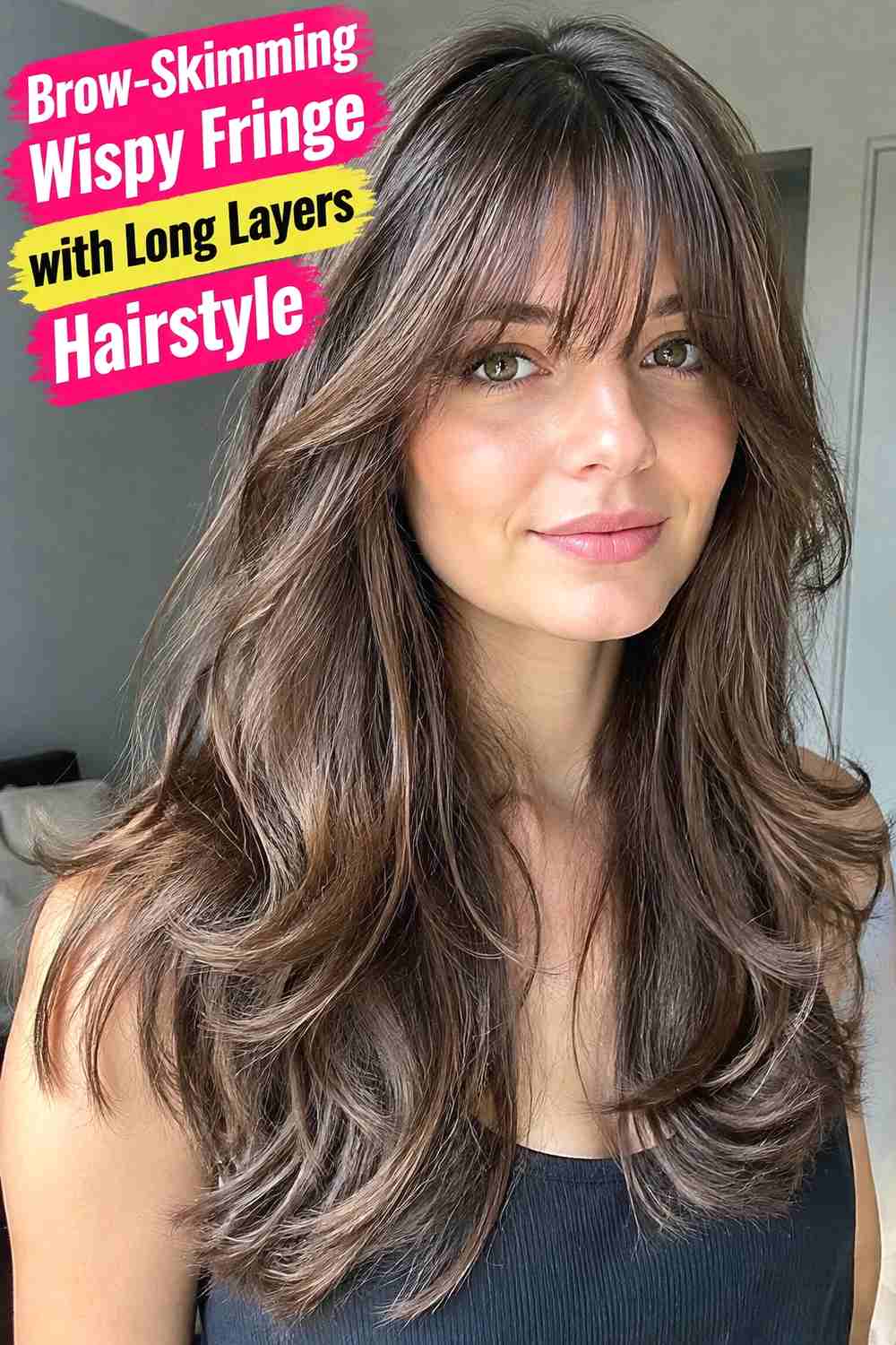 2. Brow Skimming Wispy Fringe With Long Layers Hairstyle