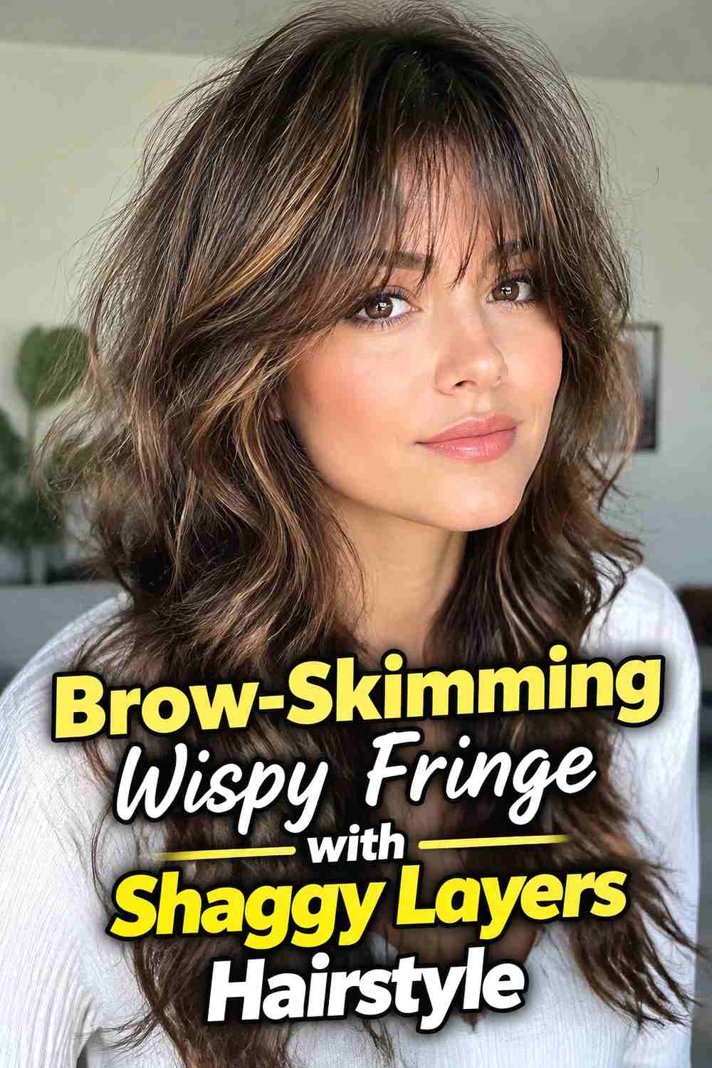 9. Brow Skimming Wispy Fringe With Shaggy Layers Hairstyle