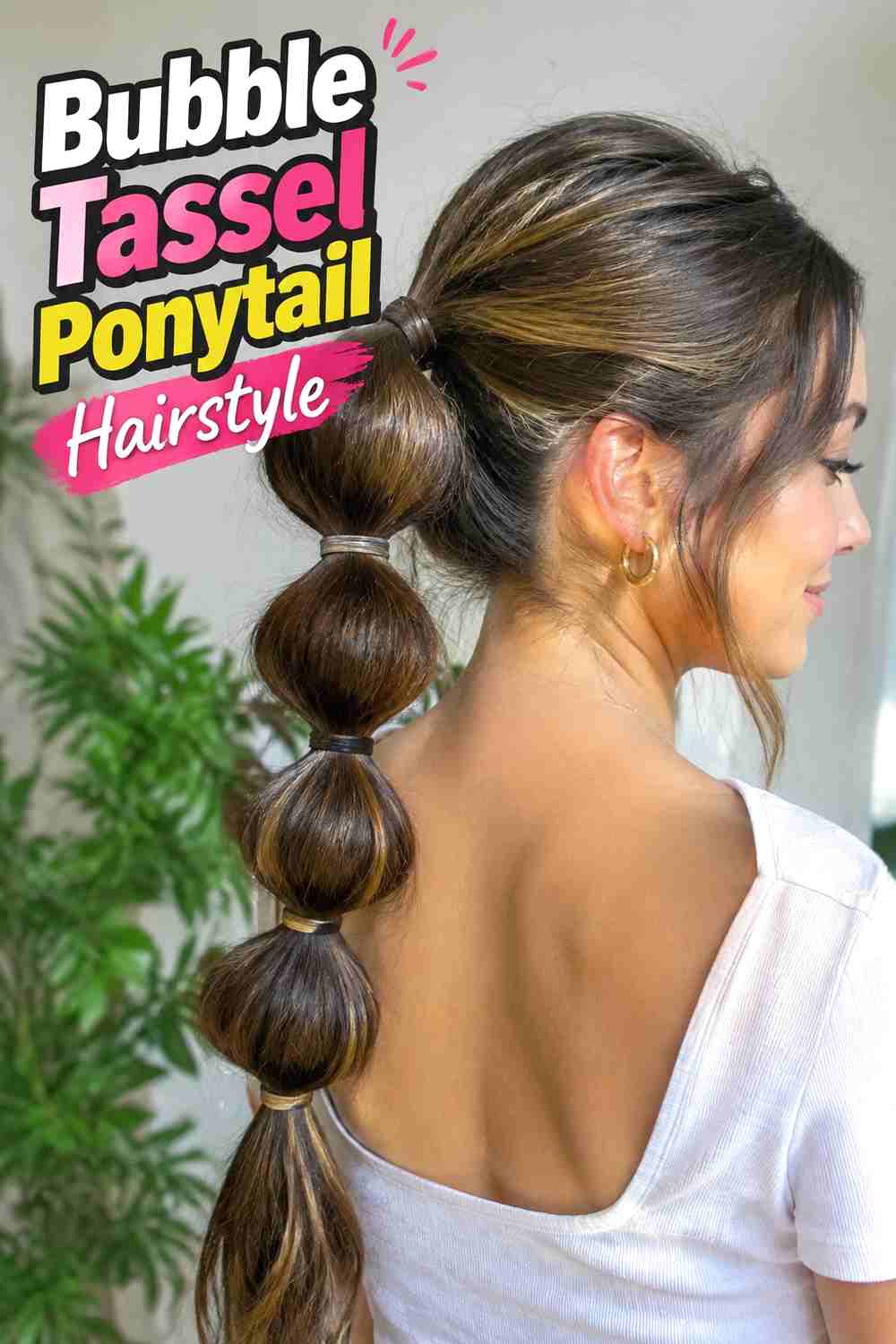7. Bubble Tassel Ponytail Hairstyle
