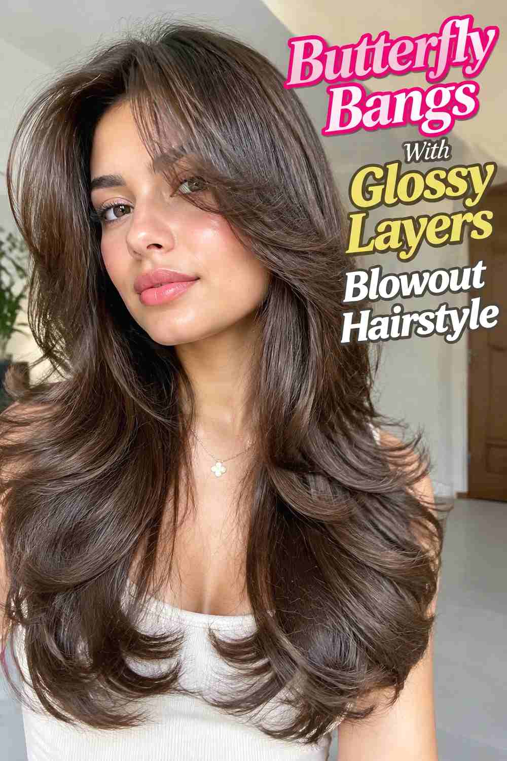 16. Butterfly Bangs With Glossy Layers Blowout Hairstyle