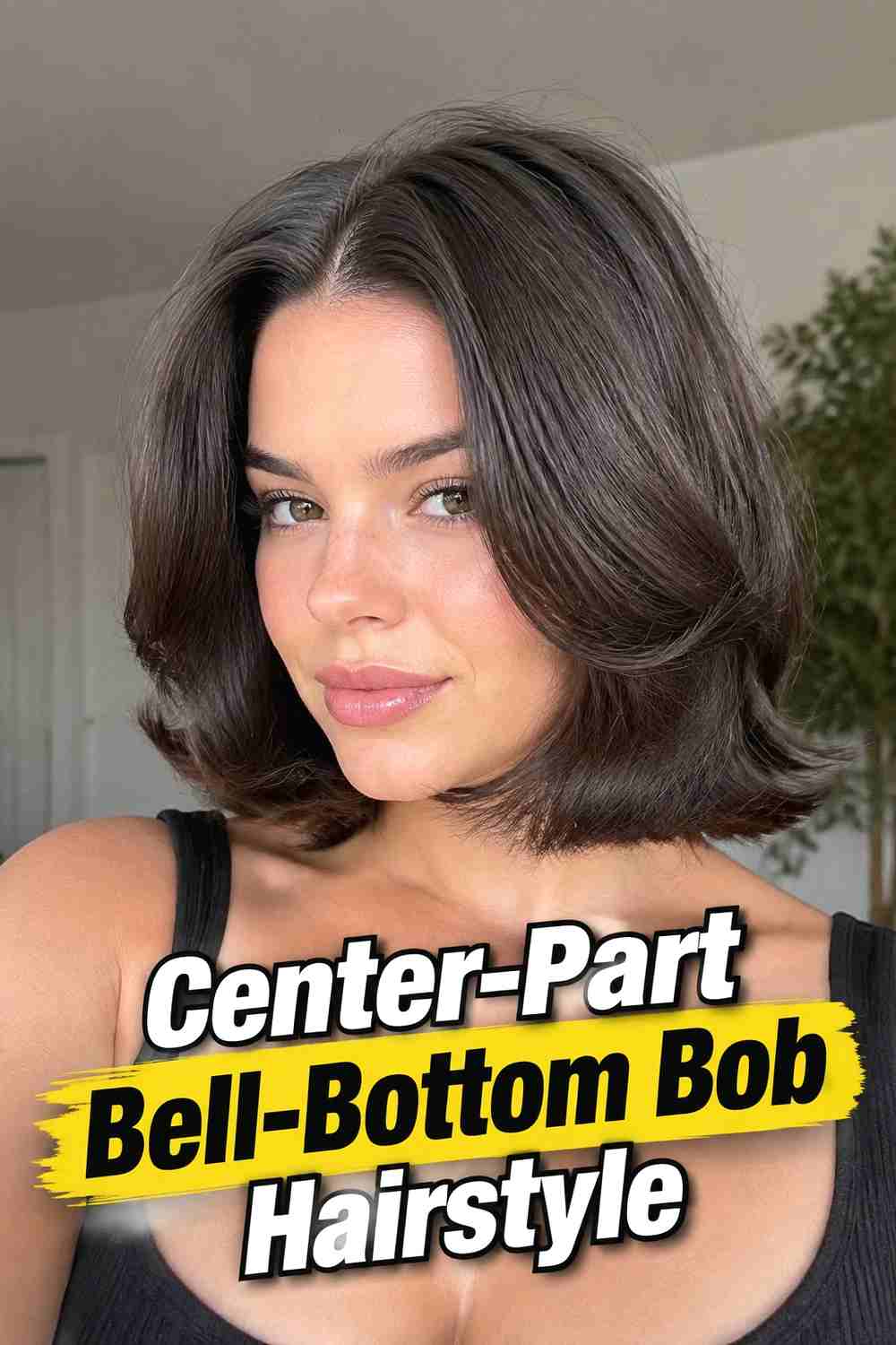 2. Center Part Bell Bottom Bob Hairstyle