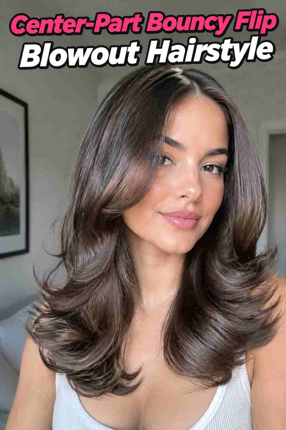 3. Center Part Bouncy Flip Blowout Hairstyle