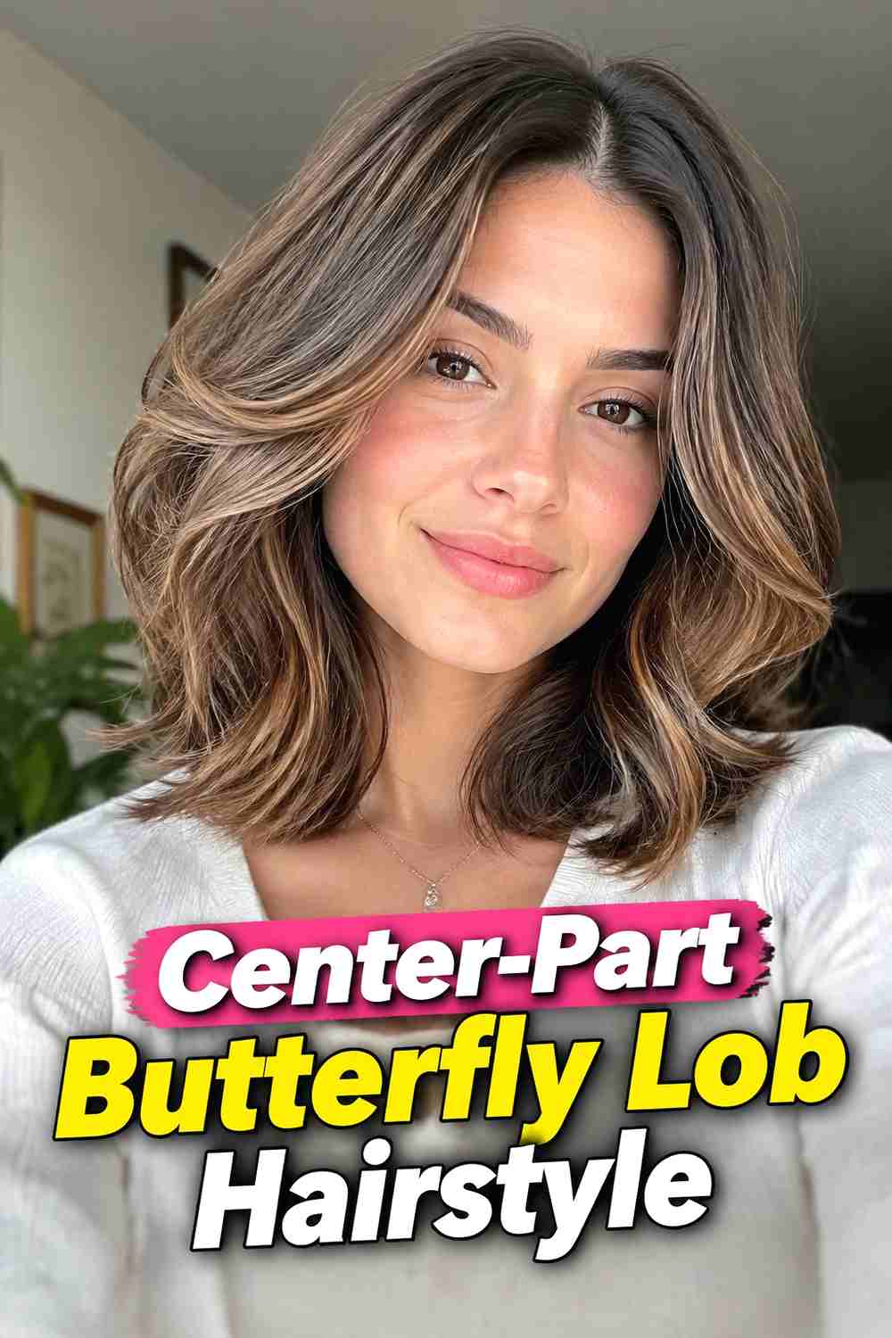 2. Center Part Butterfly Lob Hairstyle