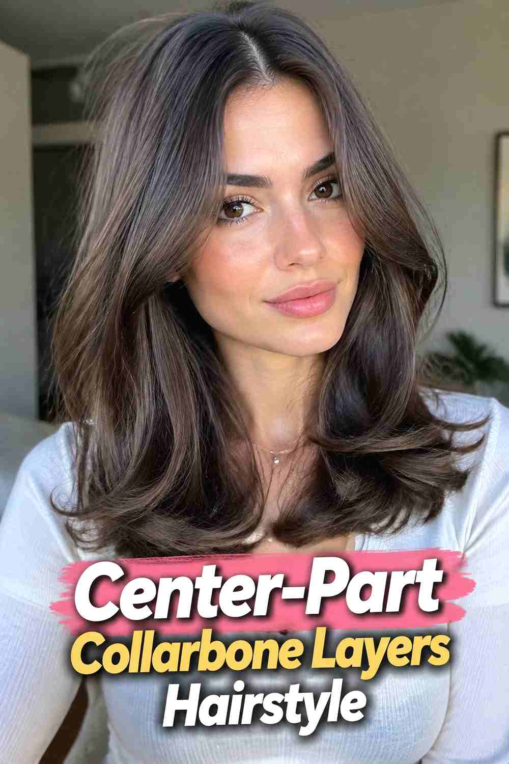 13. Center Part Collarbone Layers Hairstyle