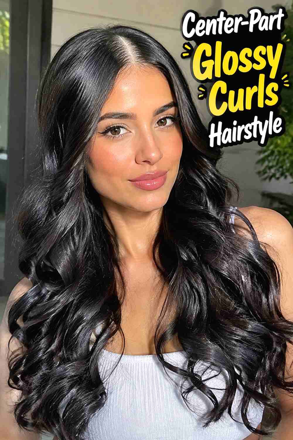 5. Center Part Glossy Curls Hairstyle