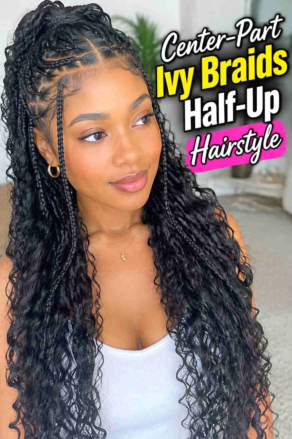 8. Center Part Ivy Braids Half Up Hairstyle