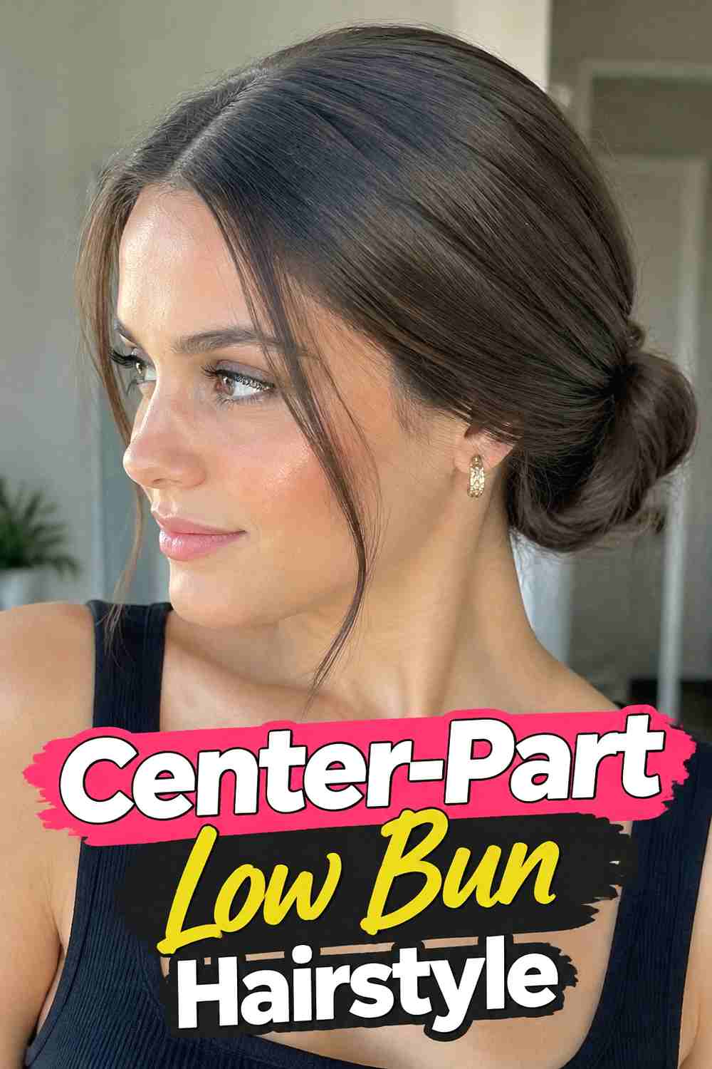 5. Center Part Low Bun Hairstyle