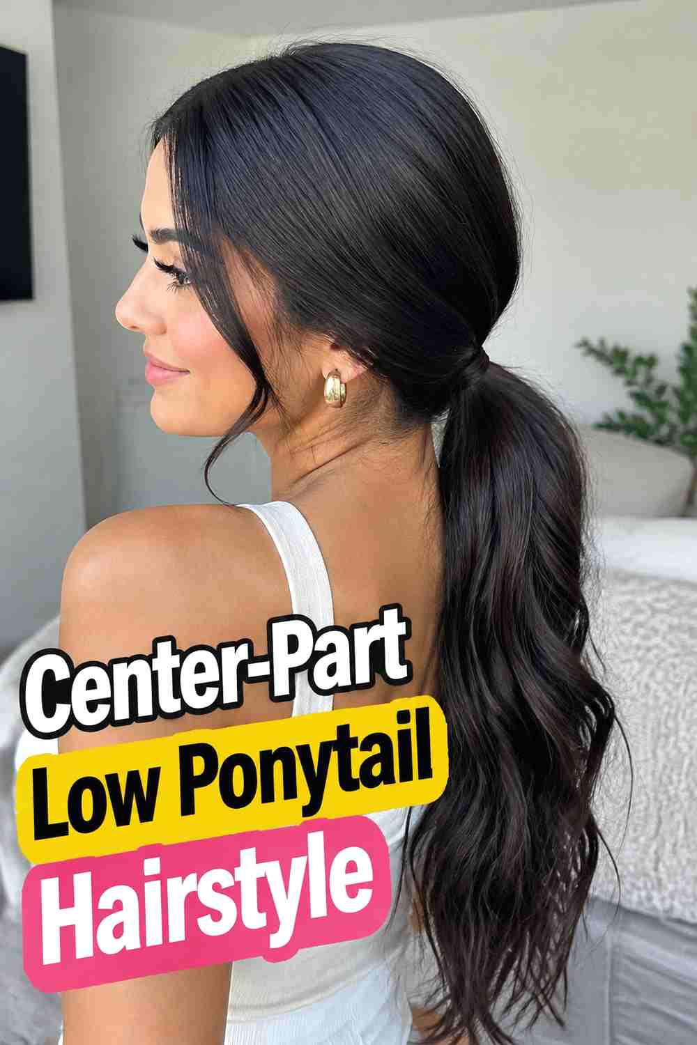 15. Center Part Low Ponytail Hairstyle