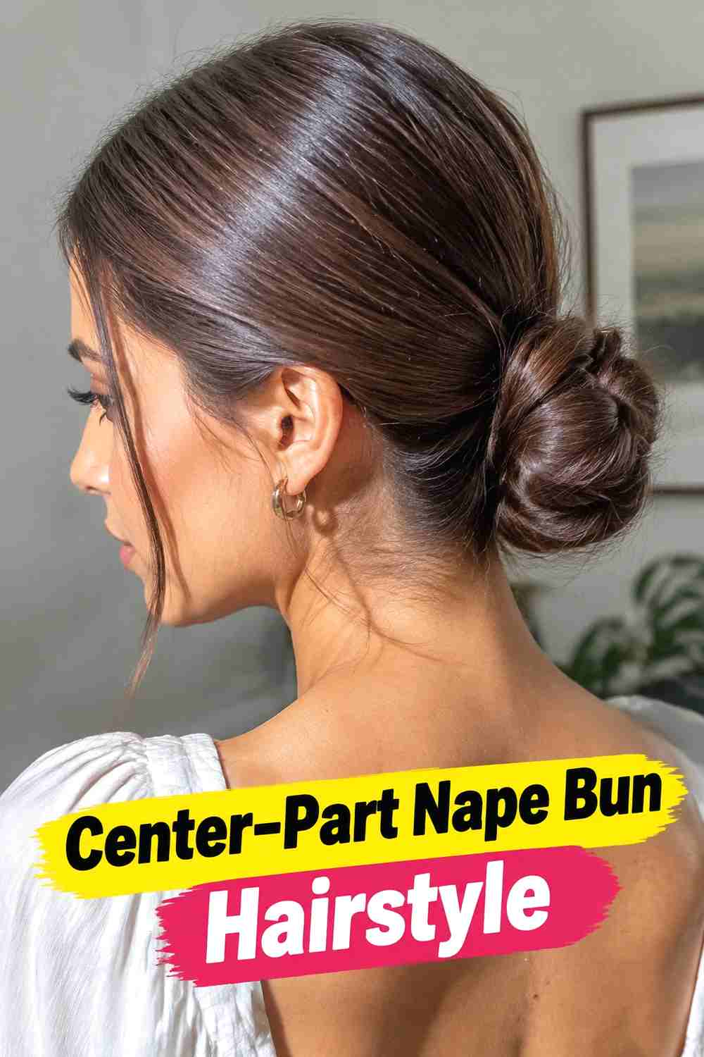 2. Center Part Nape Bun Hairstyle