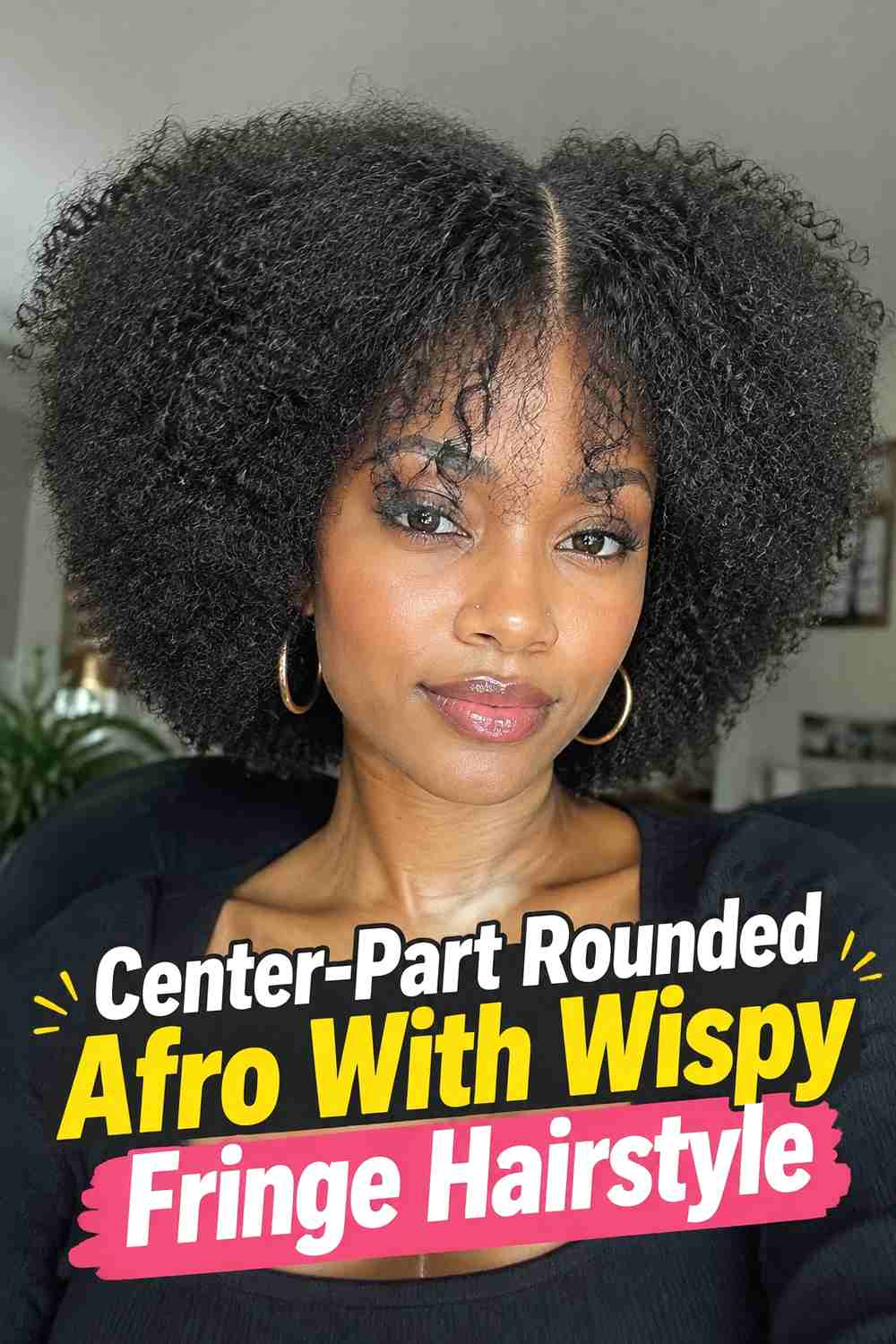 2. Center Part Rounded Afro With Wispy Fringe Hairstyle