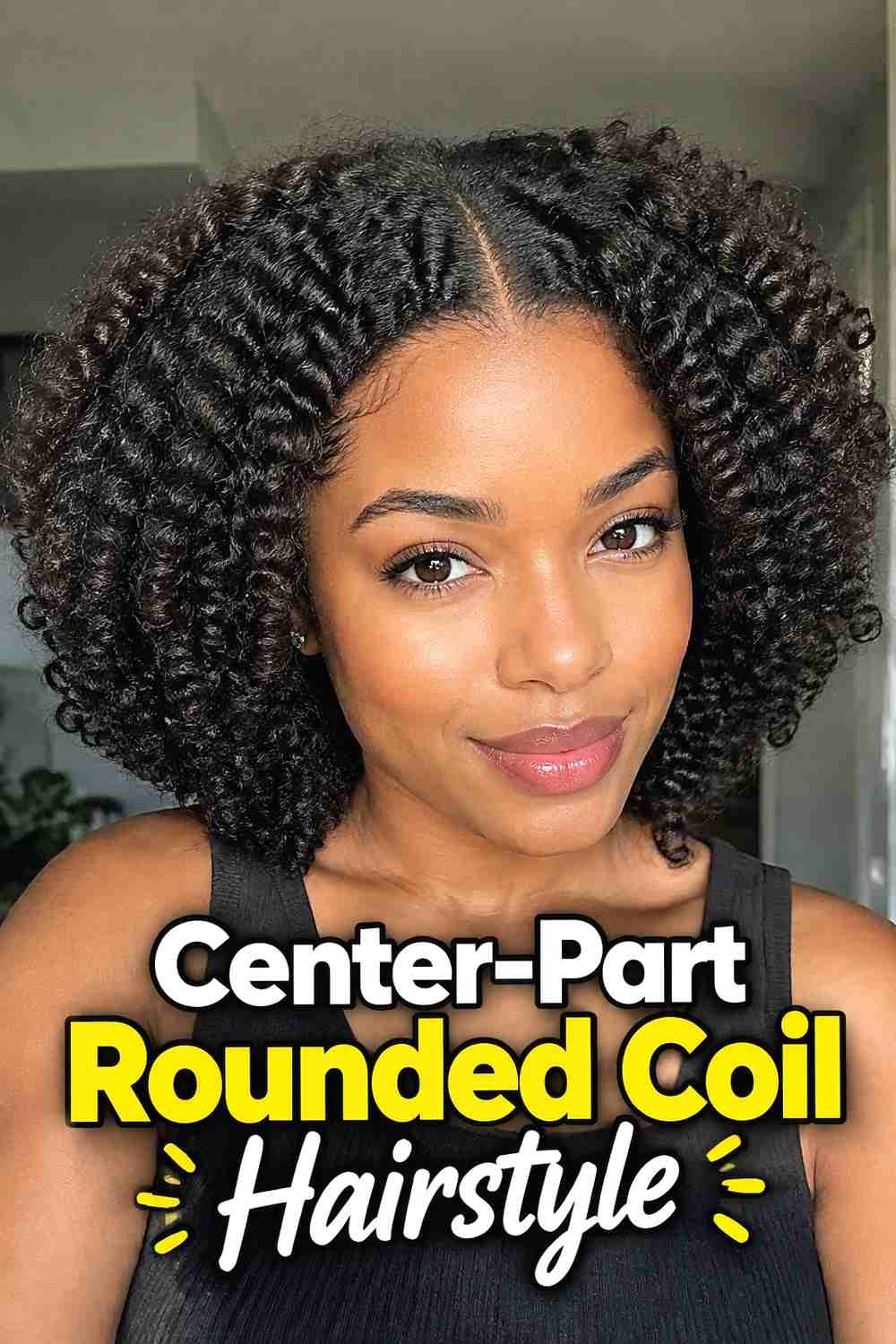 2. Center Part Rounded Coil Hairstyle