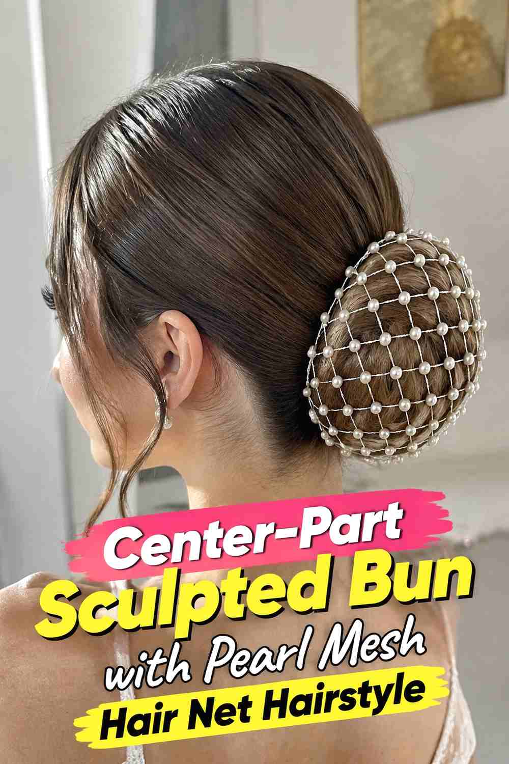 5. Center Part Sculpted Bun With Pearl Mesh Hair Net Hairstyle