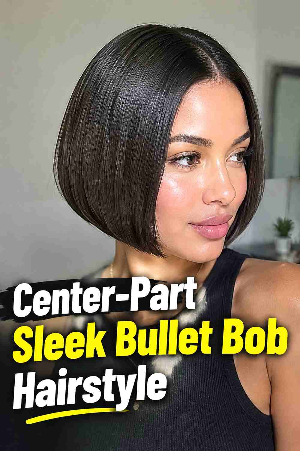 2. Center Part Sleek Bullet Bob Hairstyle